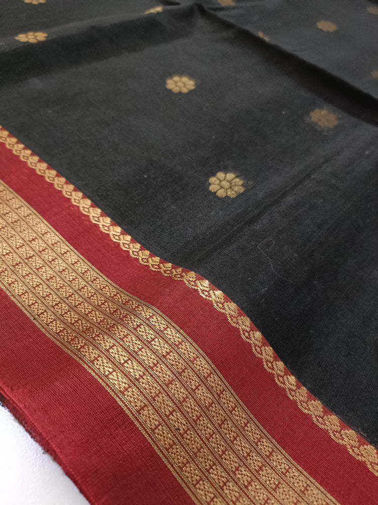 Pure Silk by Cotton Black Saree with Floral Motifs and Maroon and Golden Pallu