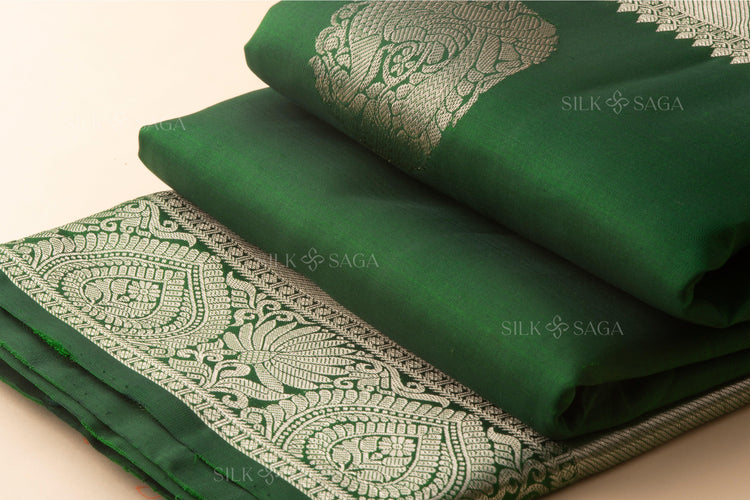 Pure Silk Bottle Green Kanchipuram Saree with Silver Zari Border and Pallu - Silksaga Studio