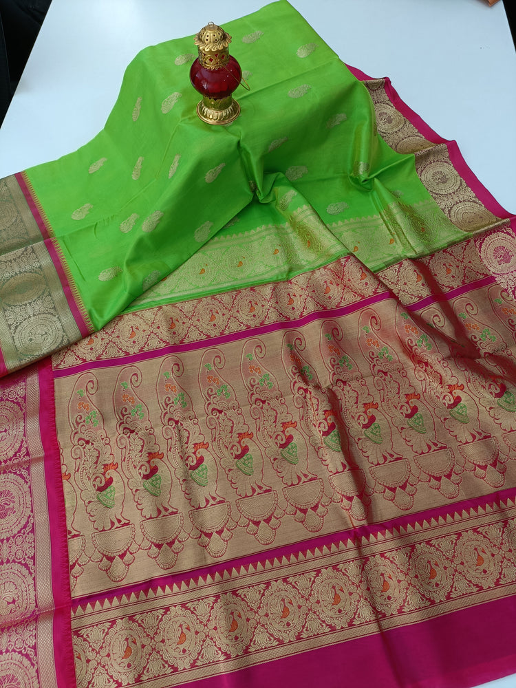 Parrot Green Art Silk Traditional Saree with Floral Woven Border...