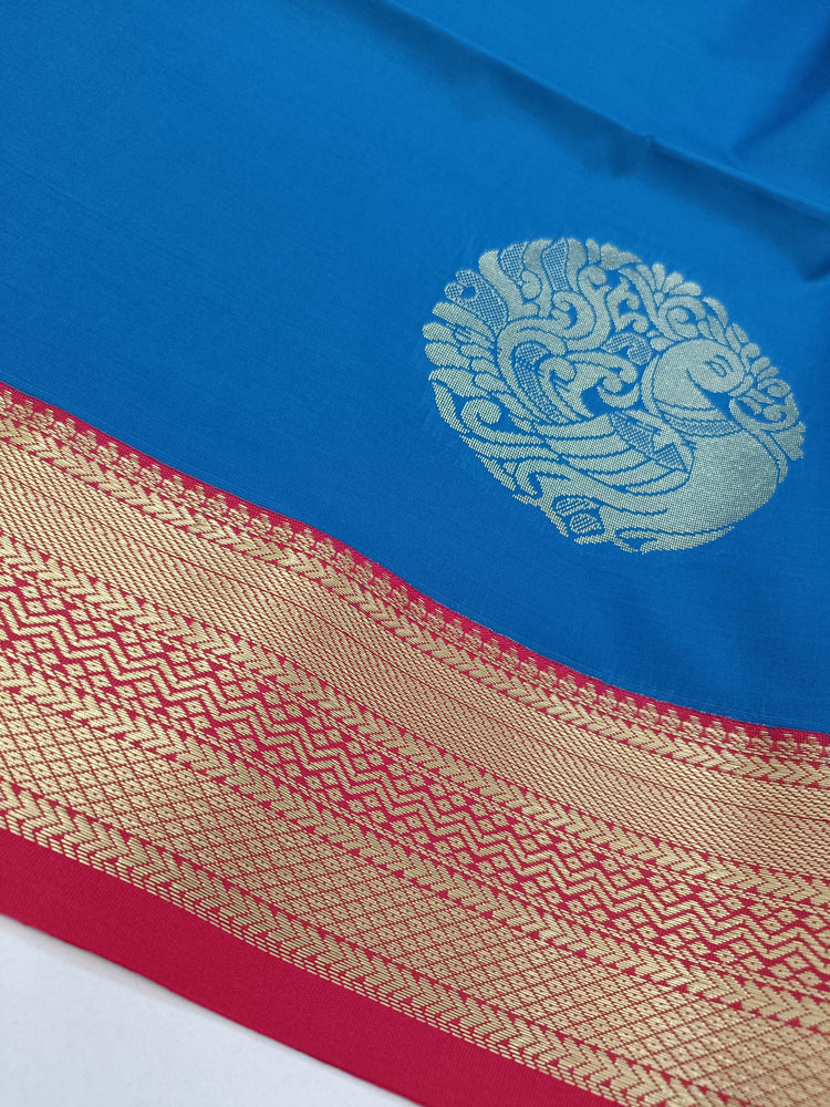 Royal Blue Art Silk Saree with Peacock Motifs and Dark Pink Pallu in Rich Golden Zari Work